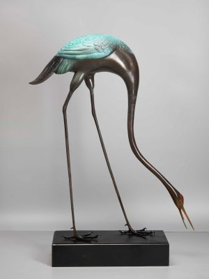 The red-crowned crane with head lowered