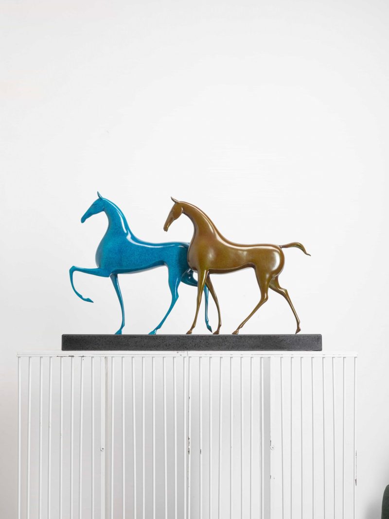 Two horses running side by side 3