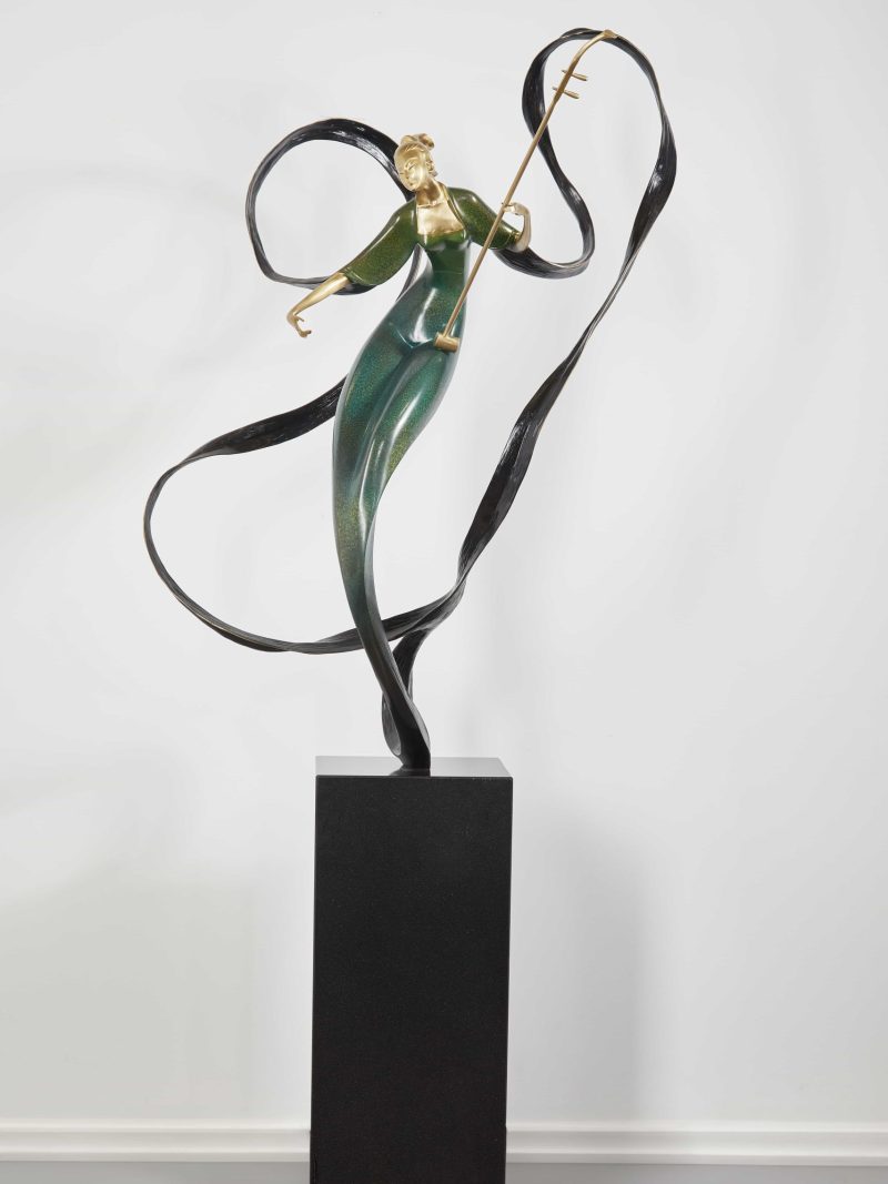 The woman playing the erhu - the elegant flowing scarf