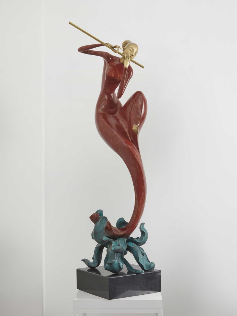 The lady playing the flute-red