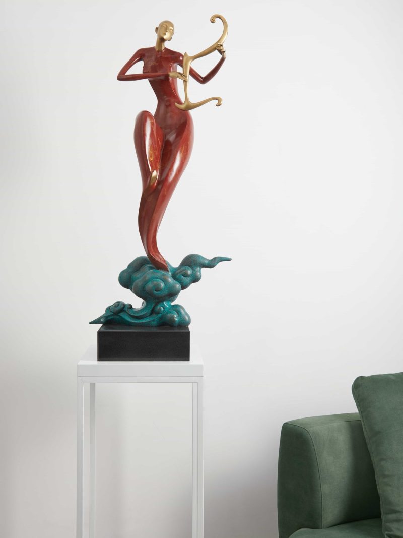 A lady playing the Chinese  instruments-red