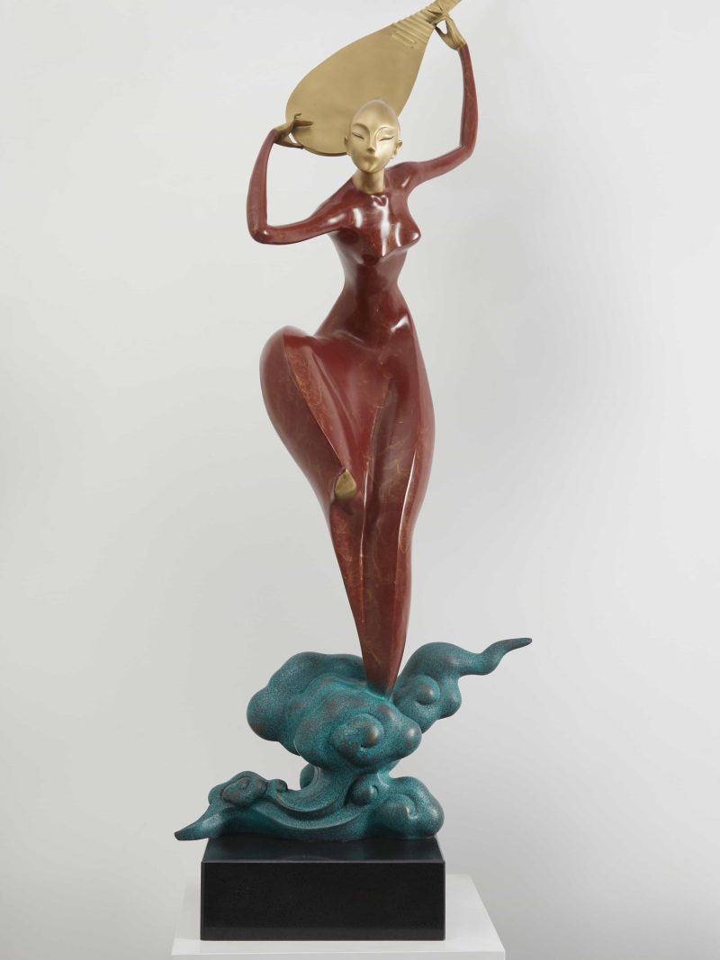 A lady dancing and playing the Chinese  instruments4-red