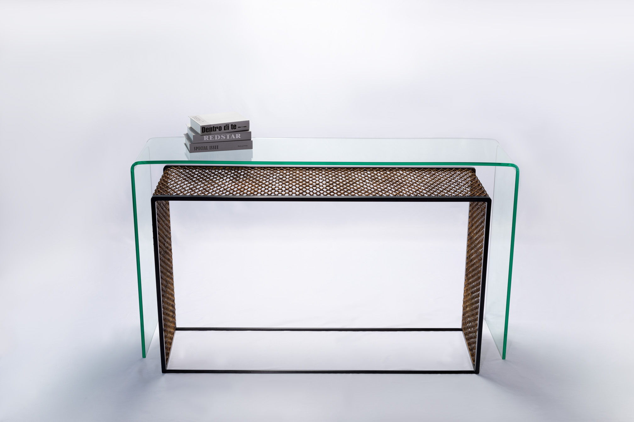 Front view of the bronze mesh console table with waterfall glass edges