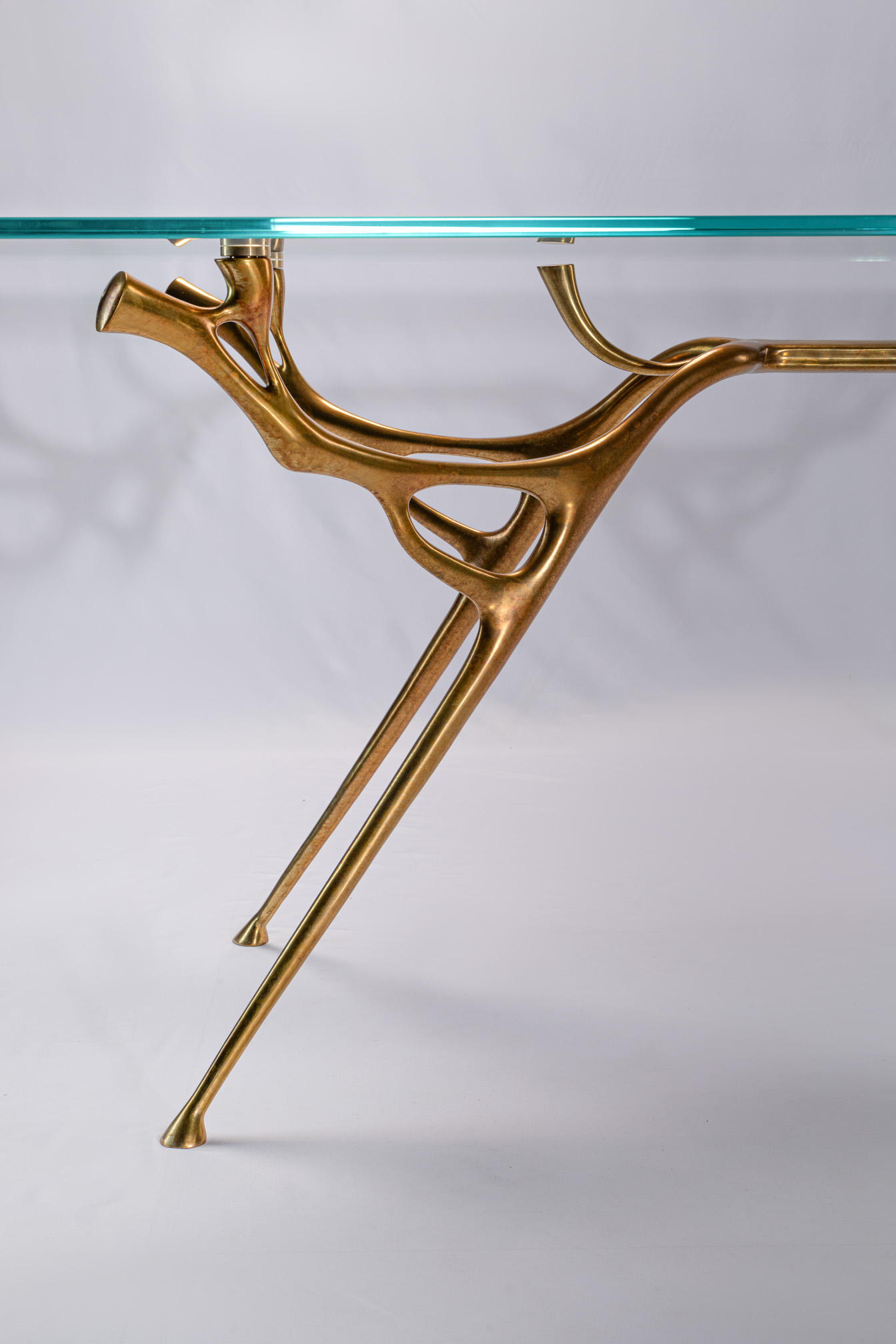 Side view of the bronze glass dining table
