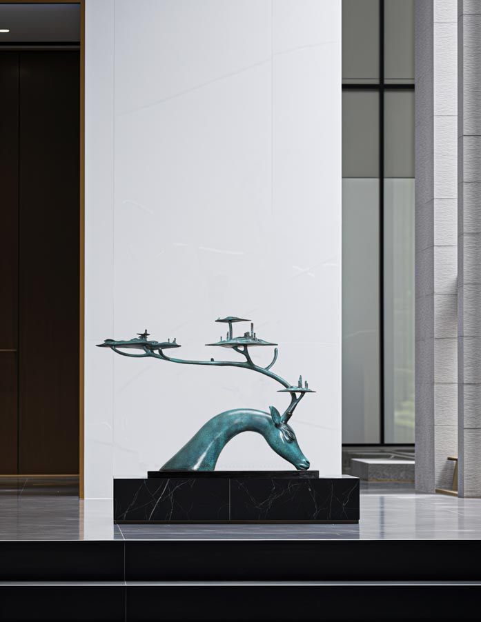 Large teal patina deer with tree-canopy antlers — lobby lifestyle.