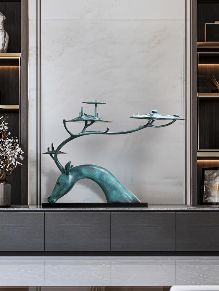 Large teal patina deer with tree-canopy antlers — sideboard lifestyle.