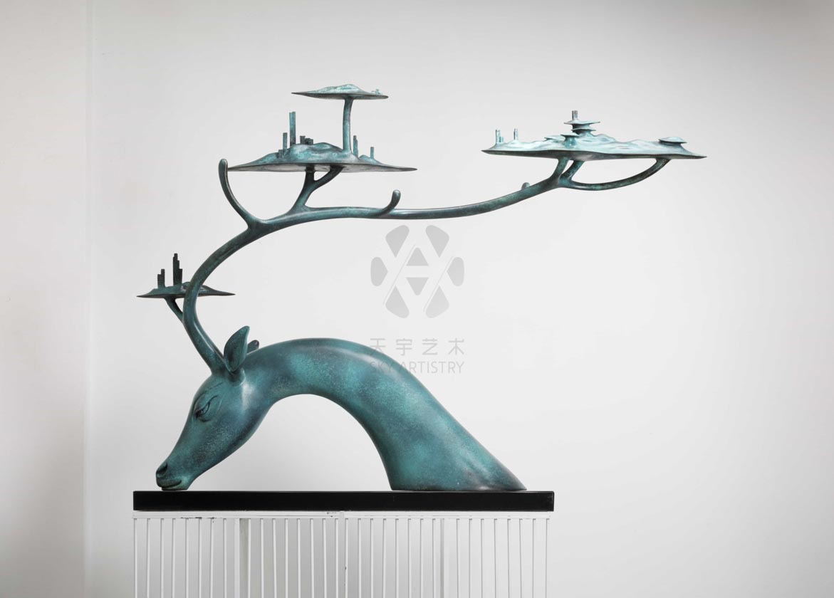 Large teal patina deer with tree-canopy antlers — front three-quarter.