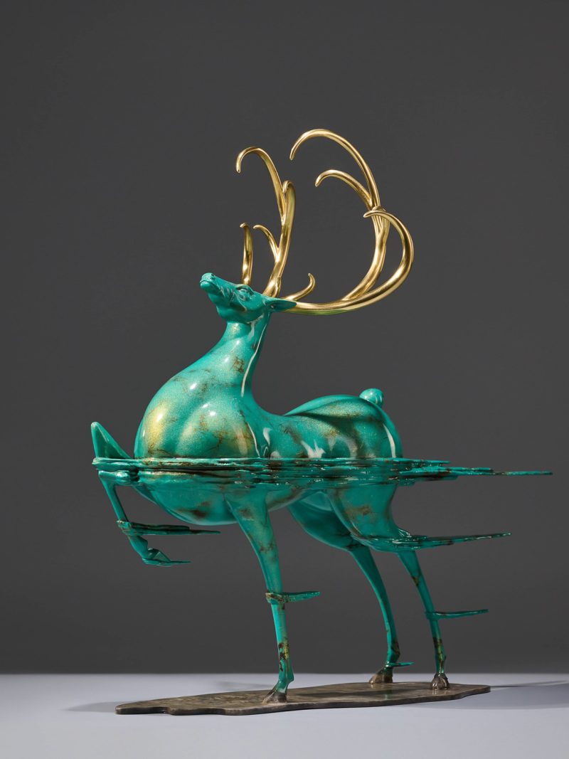 The deer moving forward against the wind