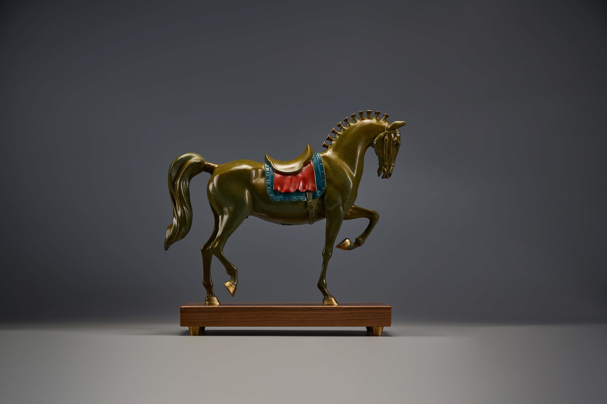Reddish-brown tang-style horse with painted saddle — opposite three-quarter.