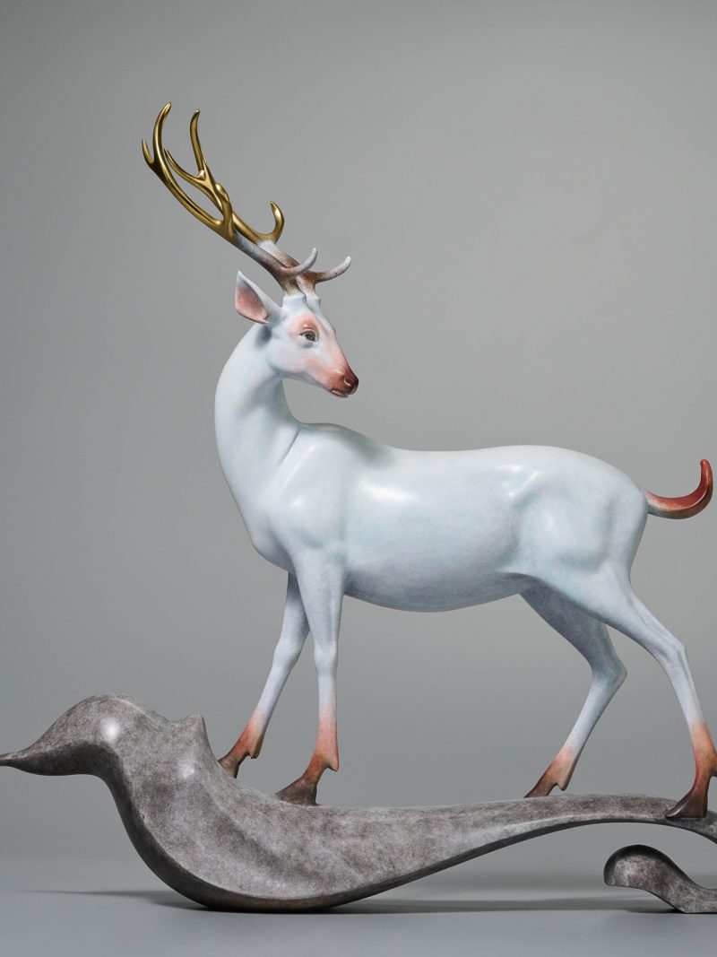 The deer stands on the cloud.