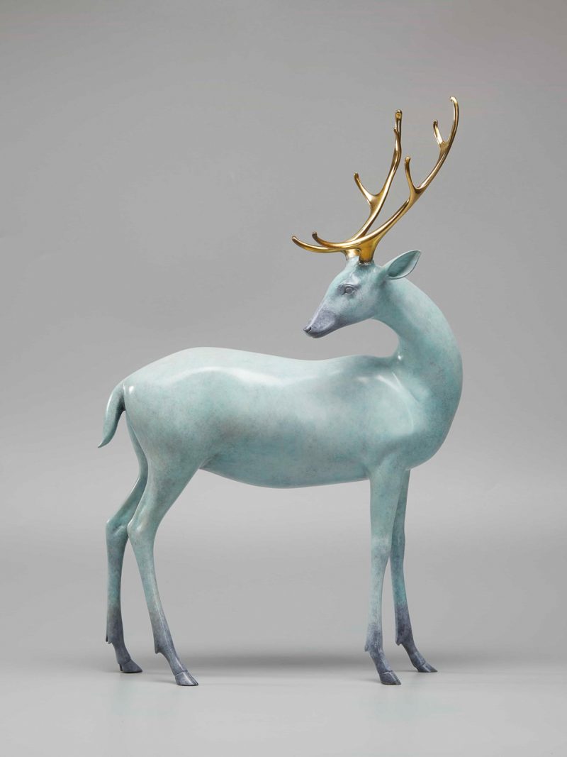 The deer with fresh colors, golden horns
