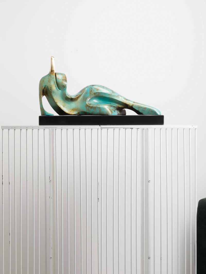 Abstract, recumbent human body(green