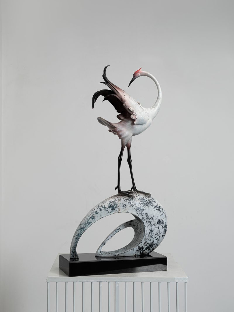 The white crane stood there.