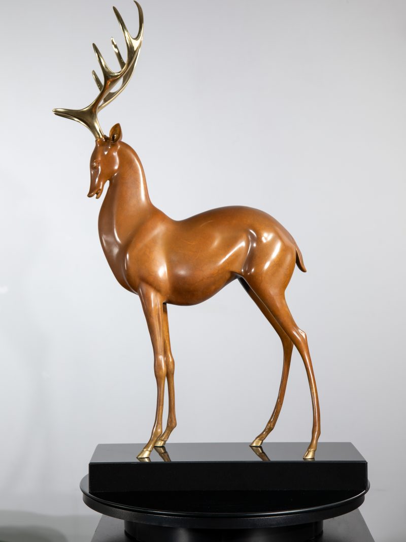 The brown, low-lying deer with golden antlers