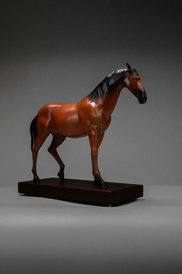 Liver-chestnut horse with black mane on wooden base — side view.